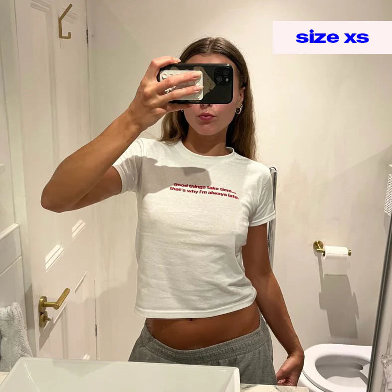 'A Great Man Is Just An Average Woman' Baby Tee